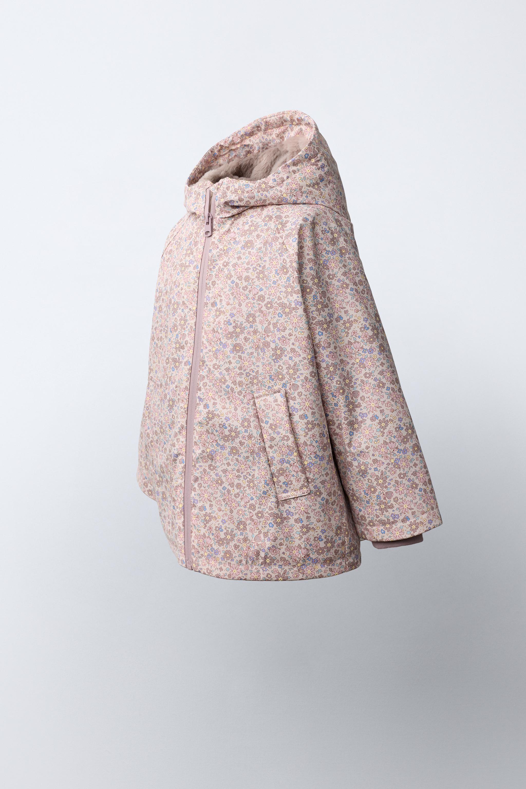 WATER-REPELLENT RUBBERIZED FLORAL RAINCOAT